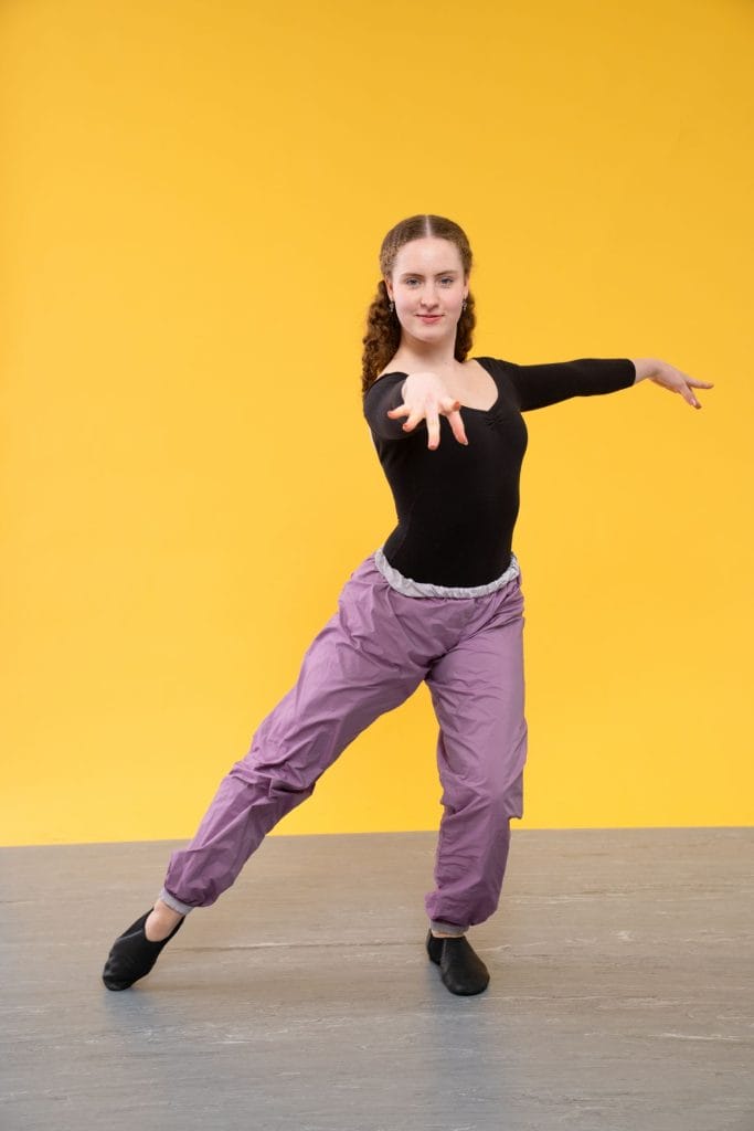 tap dancer showcasing timestep marley dance floor pre-cut