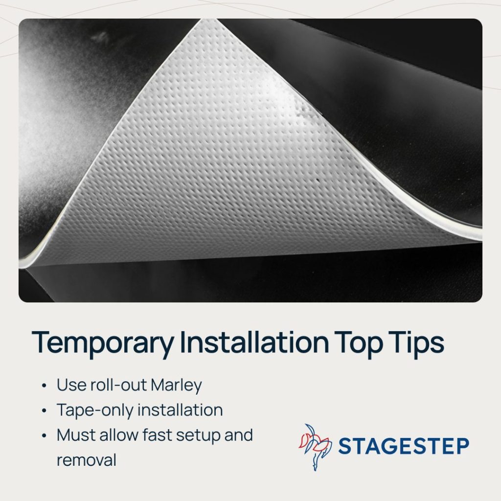 Close-up of roll-out Marley dance flooring being lifted during temporary dance floor installation, showing tape-only installation for fast setup and removal. 